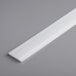 a white plastic strip on a gray surface