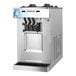 A stainless steel Spaceman 6235-C soft serve countertop ice cream machine with two hoppers and three dispensers.