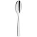 A WMF by BauscherHepp stainless steel serving spoon with a long handle and a silver spoon bowl.