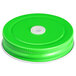 A green metal lid with a white circle.