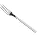 a silver fork on a white background