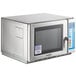 A Solwave stainless steel commercial microwave with a digital display.