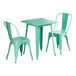 A Lancaster Table & Seating aquamarine table and two chairs.