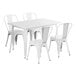 A Lancaster Table & Seating white rectangular outdoor table with four white chairs.