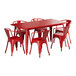 A Lancaster Table & Seating ruby red table with chairs.