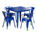 A blue metal Lancaster Table & Seating outdoor table with four chairs.