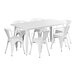 A white Lancaster Table & Seating outdoor table with six chairs.
