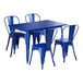 A blue metal table with a metal frame and four blue chairs.