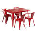 A Lancaster Table & Seating ruby red table with red metal legs and four arm chairs.