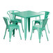 A green square Lancaster Table & Seating outdoor table with white legs surrounded by four green chairs.