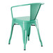 A turquoise metal chair with arms and a backrest.