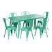 A Lancaster Table & Seating aquamarine table with chairs around it, one chair pulled out.