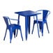 A Lancaster Table & Seating blue metal table and two chairs with arms.