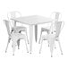 A Lancaster Table & Seating pearl white square table with four white chairs.