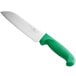 A Choice Santoku knife with a green handle and granton edge.