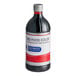 A close up of a McCormick Culinary Red Food Color bottle.