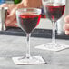 a pair of wine glasses on a counter