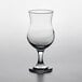 A close up of a Pasabahce Capri clear glass with a stem.