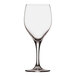 A clear Nude Primeur wine glass with a stem.