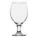 A close-up of a clear Pasabahce Capri wine goblet with a foot.