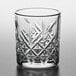 A Pasabahce Timeless Vintage juice glass with a pattern on it.