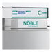 A stainless steel Noble Warewashing HT-180EC high temperature dishwasher with a digital temperature display.