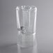 A clear plastic container with a white plastic lid.