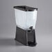 A black plastic Choice 3 gallon beverage dispenser with a slim design.