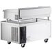 A stainless steel Cooking Performance Group gas countertop griddle on wheels with a white background.