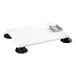 A white rectangular Garde portable mounting base with black suction cups on a table.