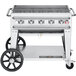 A Crown Verity liquid propane outdoor grill with wheels.