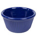 A navy blue fluted melamine ramekin.