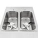 A Spaceman stainless steel countertop slushy machine with two bowls and faucets.