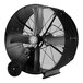 A large black TPI industrial drum fan with wheels.