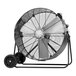 A large black TPI industrial drum fan on wheels.