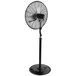 A black TPI industrial pedestal fan.