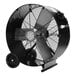 A large black TPI industrial drum fan with wheels.