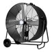 A large black TPI industrial drum fan with wheels.