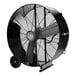 A large black TPI industrial drum fan with wheels.