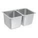 A Vollrath stainless steel undermount sink with two compartments.