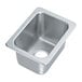 A silver stainless steel sink with a hole in it.