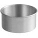 A silver aluminum Choice round cake pan.