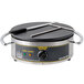 A Carnival King 16" Crepe Maker with a knife on a round surface.