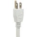 A close-up of a white plug on a white power cord.