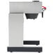 A silver and black Bloomfield airpot coffee brewer with a black base and red accents.