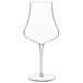 A Luigi Bormioli clear wine glass with a long stem.