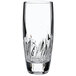 A close-up of a Luigi Bormioli Incanto beverage glass with a curved design.