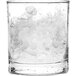 a glass with ice in it