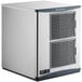 A Scotsman Prodigy Plus air cooled nugget ice machine with a door open over vents.