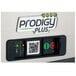 A close-up of a Scotsman Prodigy Plus air cooled flake ice machine with a QR code on it.